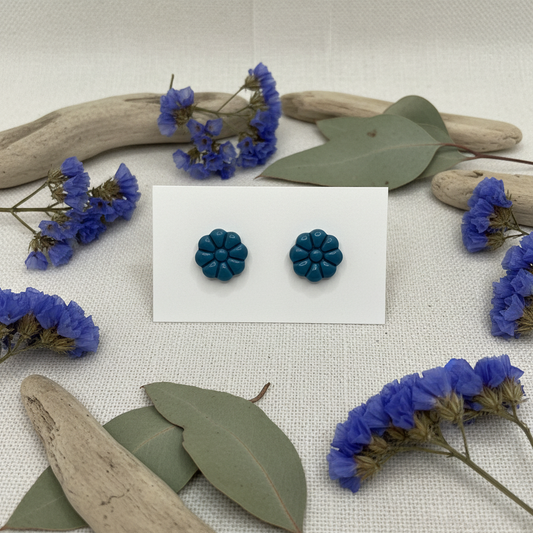 Dahlia Studs in Lyons Blue — handmade polymer clay 8-petal dahlia flower stud earrings, displayed on white card with coastal botanical styling, handcrafted in New Zealand by Crafty Larder