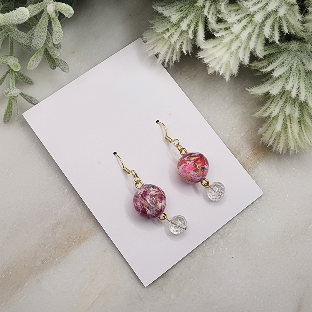 "Handmade polymer clay marble crystal drop earrings with pink coral purple round beads, clear crystal accents and gold connectors"