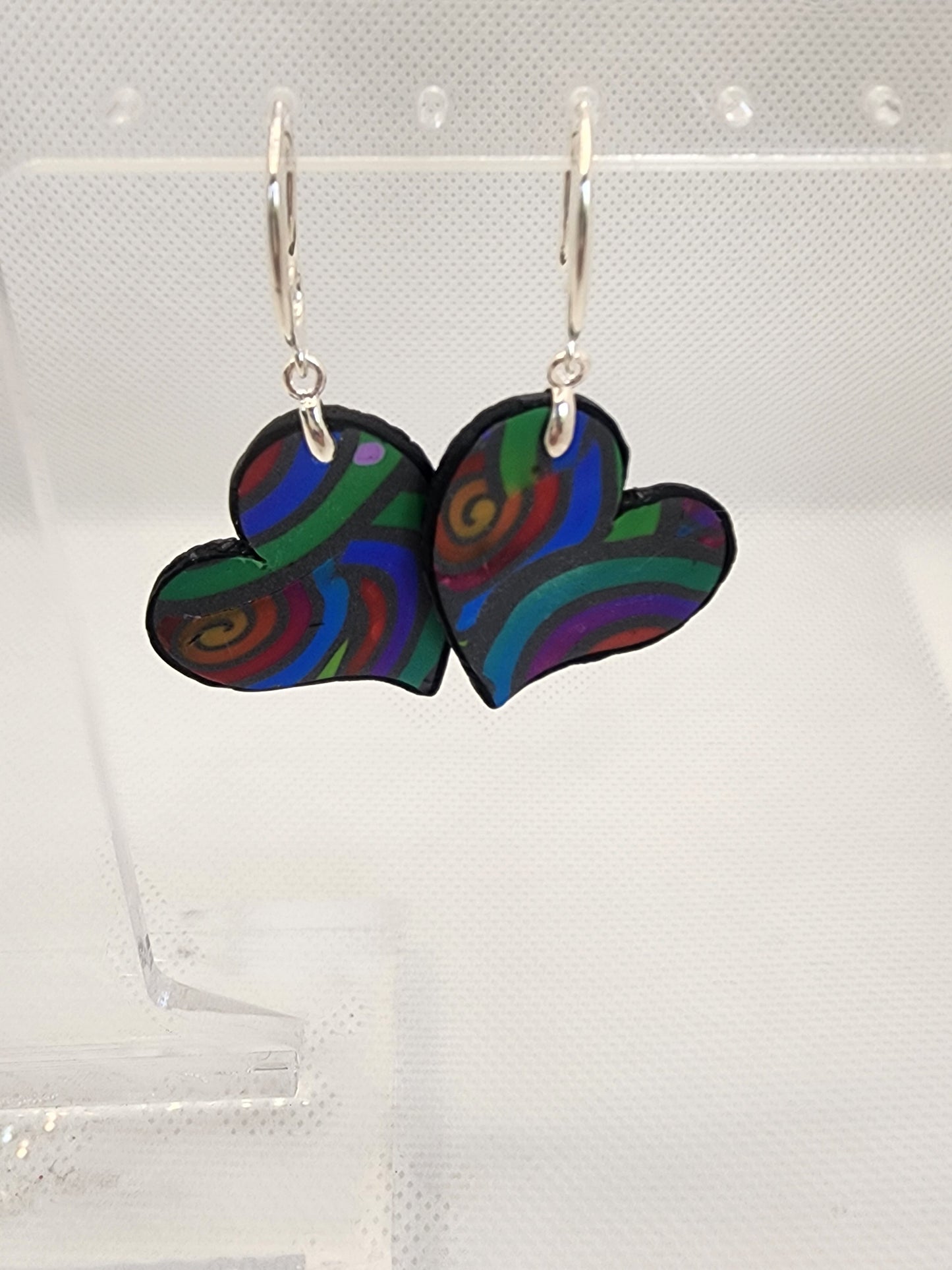 Rainbow Swirl Heart Earrings Small with silver French hooks - handmade polymer clay heart earrings with colorful rainbow swirl pattern
