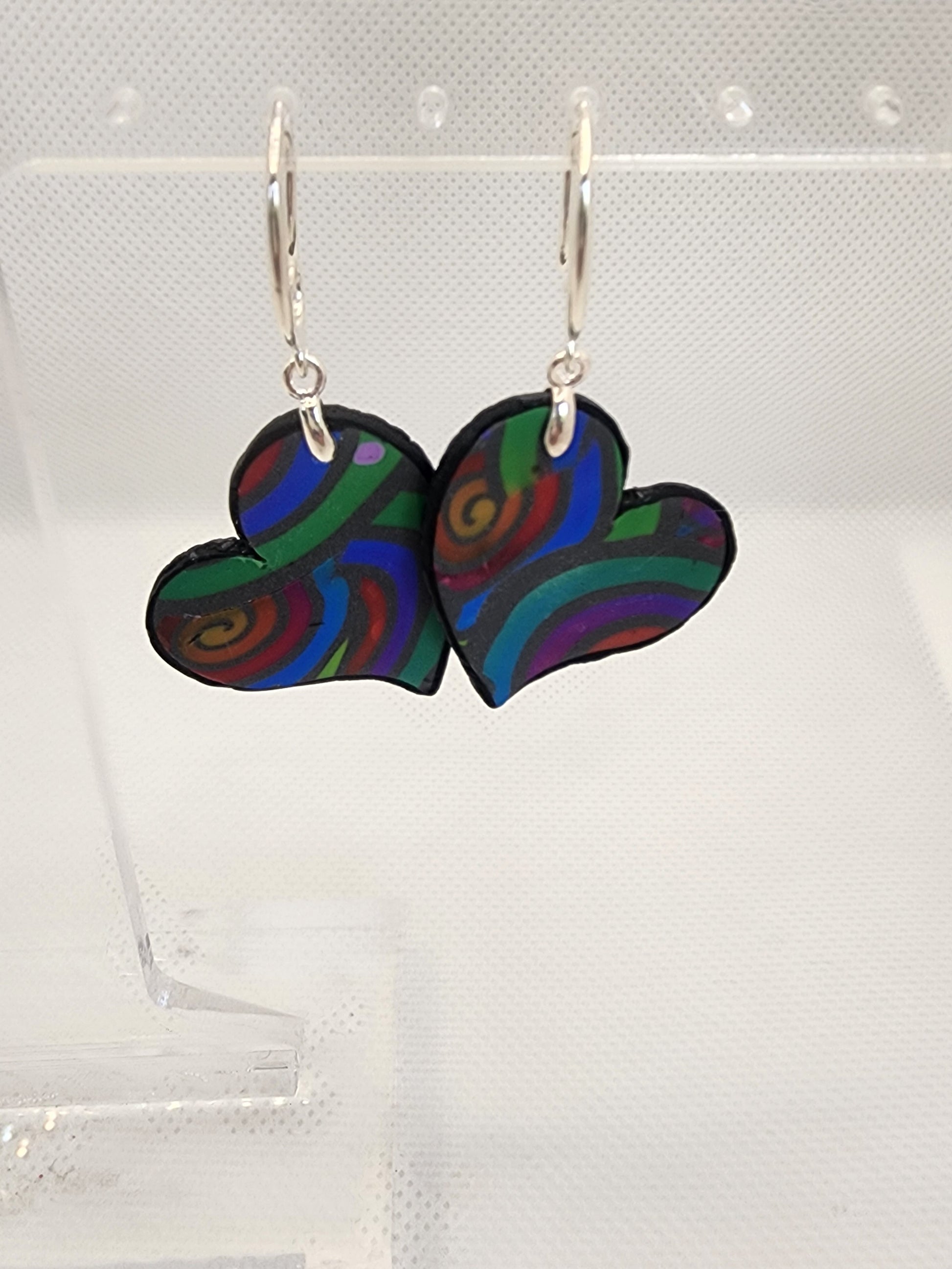 Rainbow Swirl Heart Earrings Small with silver French hooks - handmade polymer clay heart earrings with colorful rainbow swirl pattern
