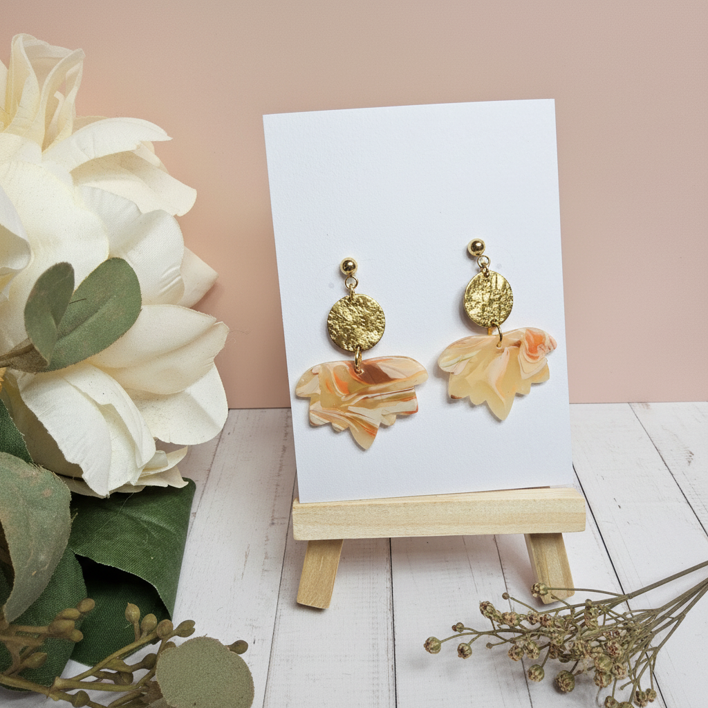 "Handmade polymer clay agate brass leaf earrings with textured gold discs and marbled leaf dangles"