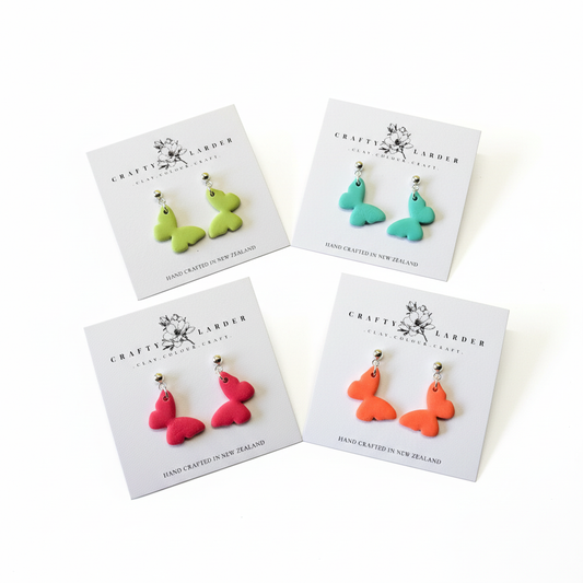 "Kids butterfly dangle earrings in four colors - orange, pink, aqua and green"