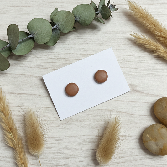  "Handmade polymer clay cocoa bean stud earrings in warm terracotta brown matte finish"