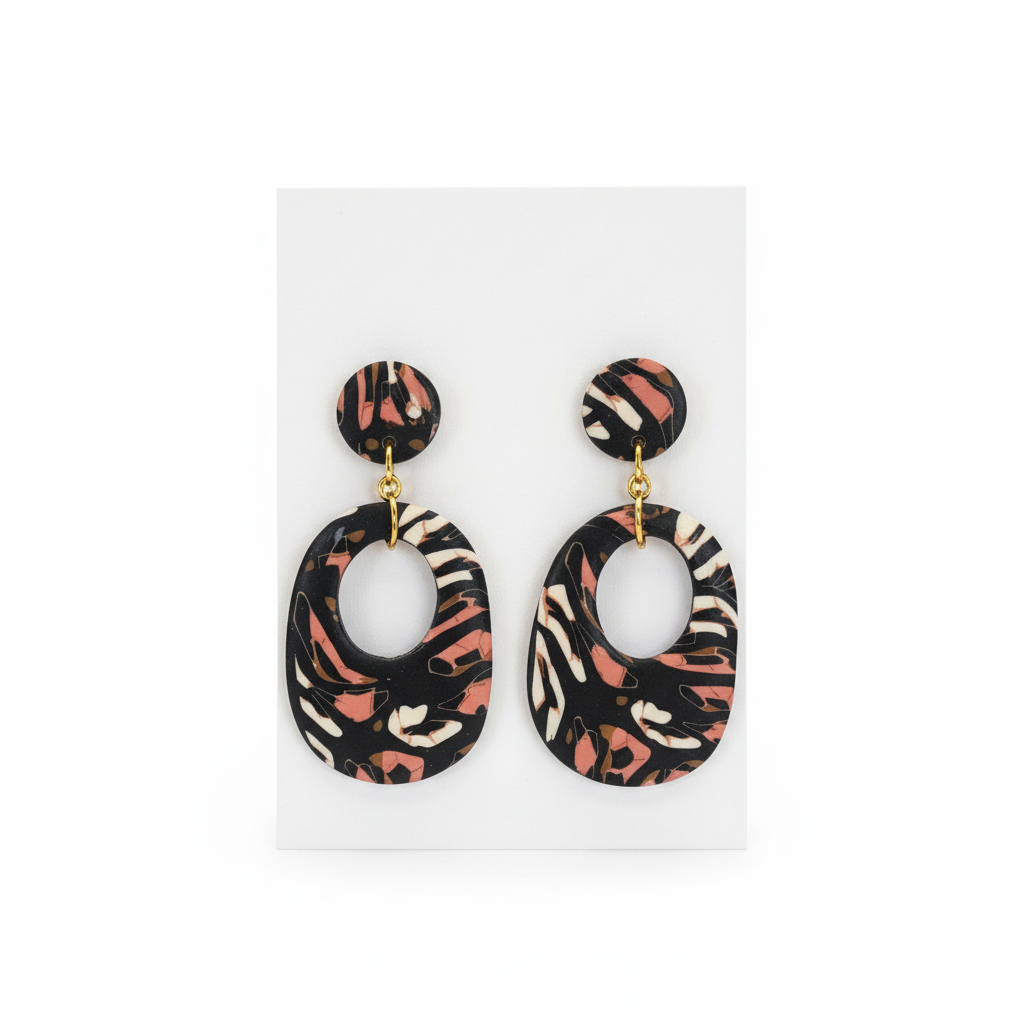 Wild Nights polymer clay cutout earrings with animal print pattern and gold connectors - handmade statement earrings New Zealand
