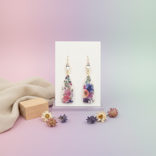 Garden Crystal Paddle Dangles — handmade polymer clay earrings with watercolour floral print and crystal marquise gold hooks, on display card