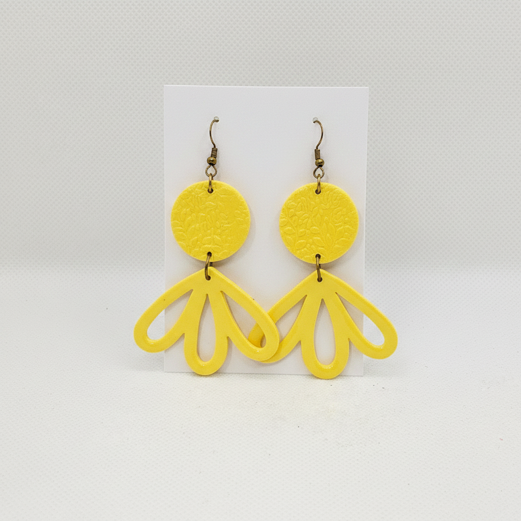 Large handmade yellow polymer clay fan petal drop earrings with brass hook findings on plain white card, by Crafty Larder NZ