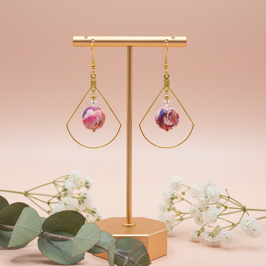 "Handmade polymer clay marble crystal duo dangle earrings with pink coral purple round beads inside gold teardrop frames and crystal accents"