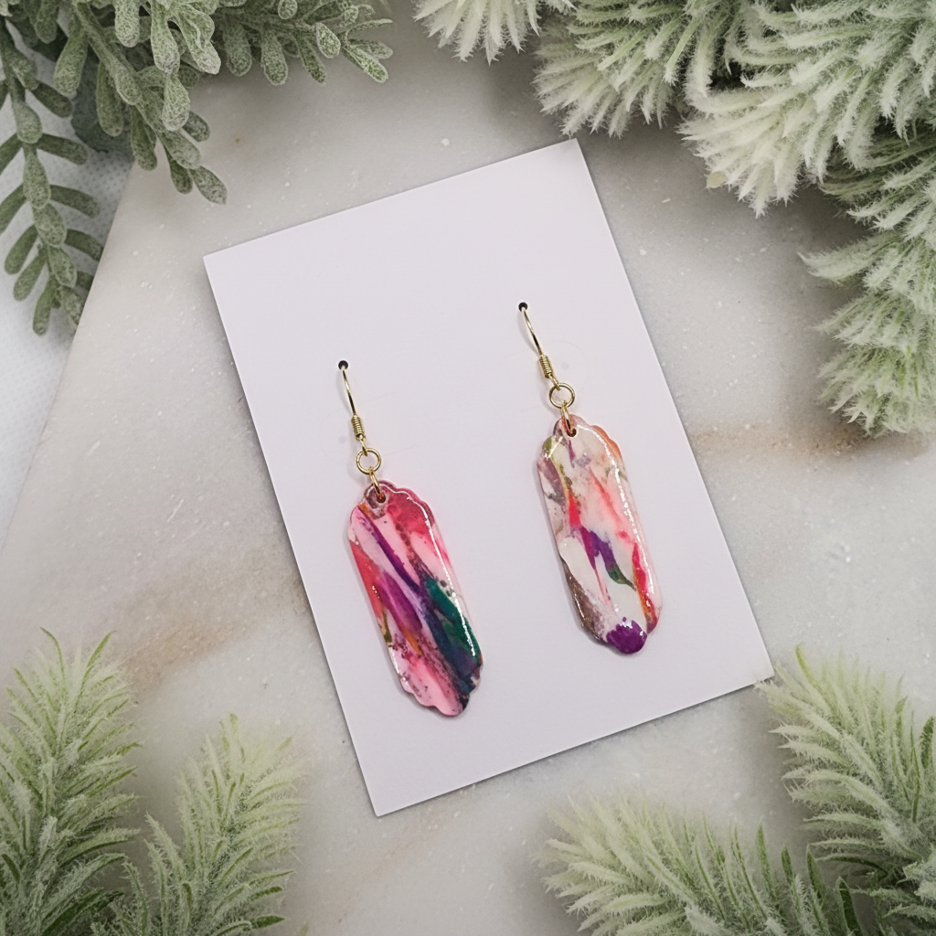 "Handmade polymer clay marble fob drop earrings with pink coral purple teal pattern and gold hooks"