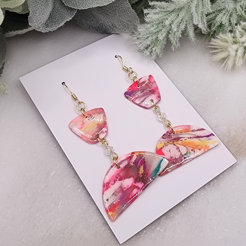  "Handmade polymer clay geometric marble earrings with pink coral orange pattern, gold connectors and crystal drops"