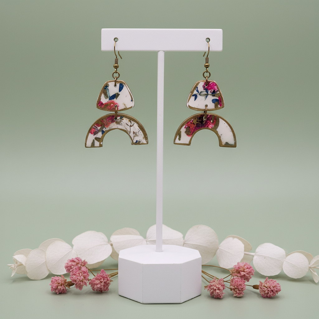 "Handmade polymer clay romantic floral arch dangle earrings with pink coral blue floral pattern on cream triangle and arch shapes with bronze connectors"