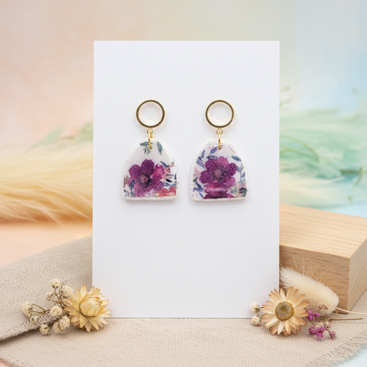 Garden Arch Dangles displayed on white card with soft pastel gradient background and dried flower styling