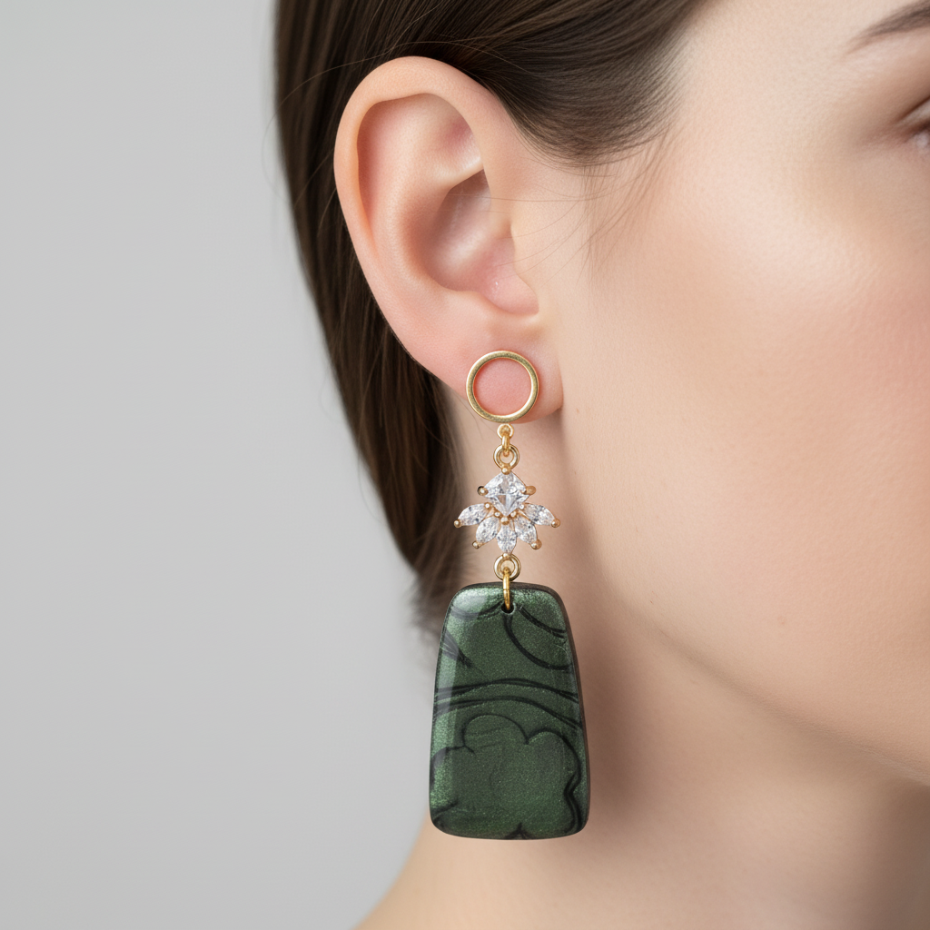 "Handmade polymer clay fob drop earrings with gold hollow circle stud posts, sparkling cubic zirconia snowflake connectors and dark green/emerald mica shimmer rectangular dangles"