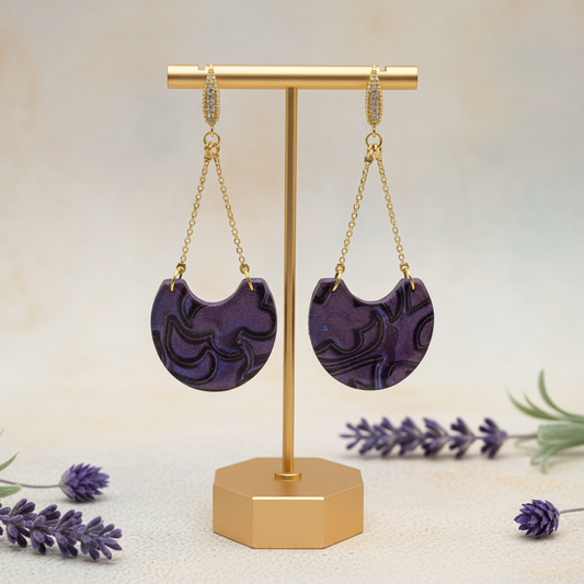 "Handmade polymer clay arc drop earrings with gold textured bar stud posts, long gold chain arcs and deep purple/violet mica shimmer half-moon dangles"